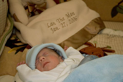 Landon in his crib