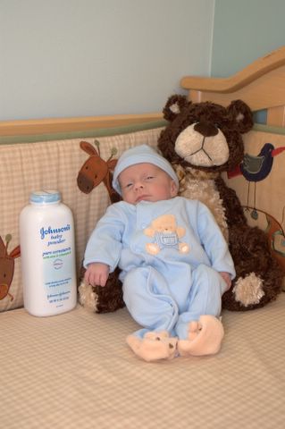 Landon with the big bear and baby powder